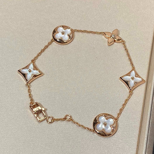 [Windsor Jewelry]STAR AND SUN 5 MOTIF MOP PINK GOLD BRACELET