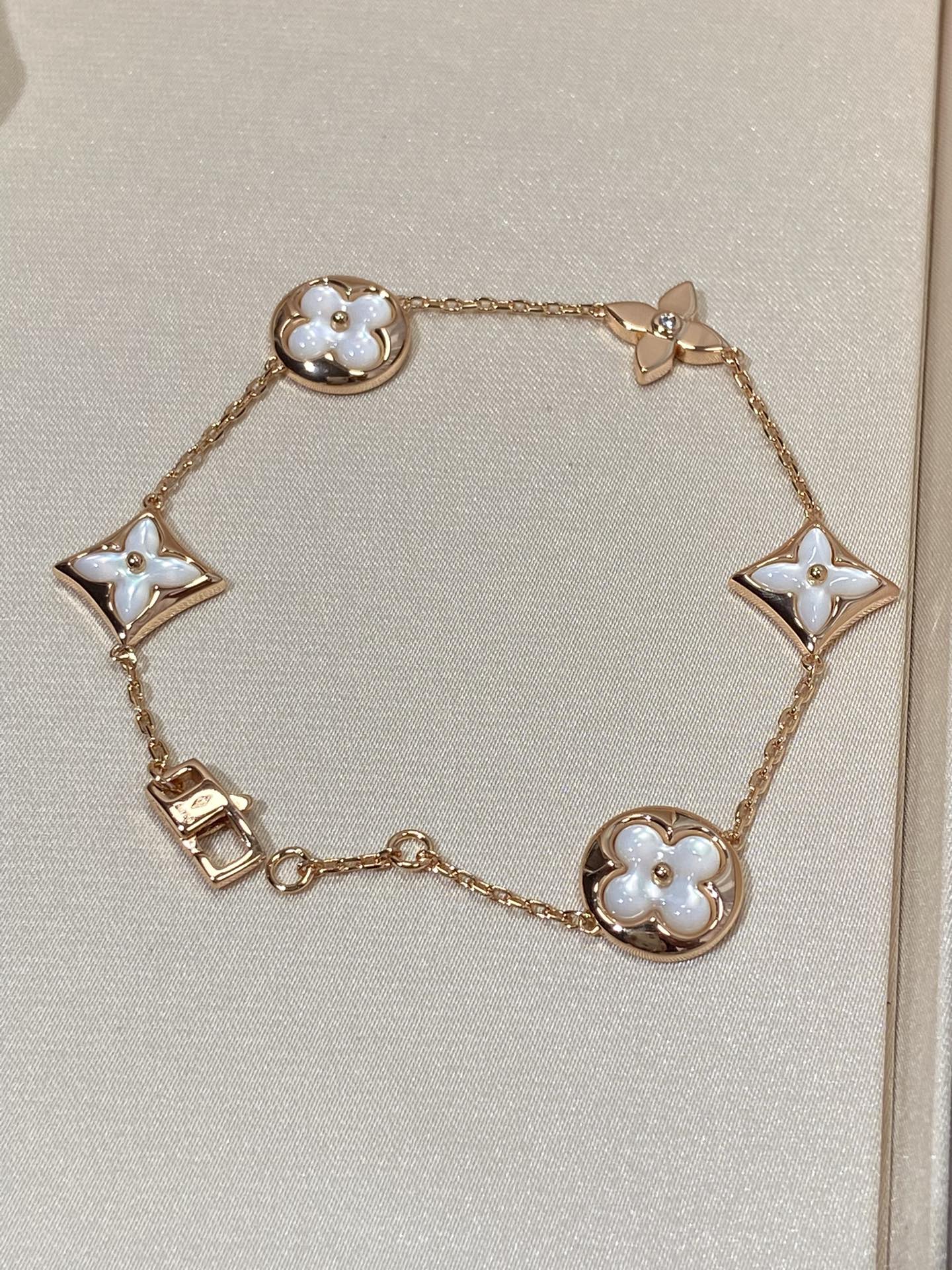 [Windsor Jewelry]STAR AND SUN 5 MOTIF MOP PINK GOLD BRACELET