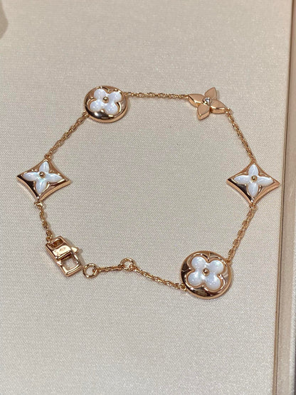 [Windsor Jewelry]STAR AND SUN 5 MOTIF MOP PINK GOLD BRACELET