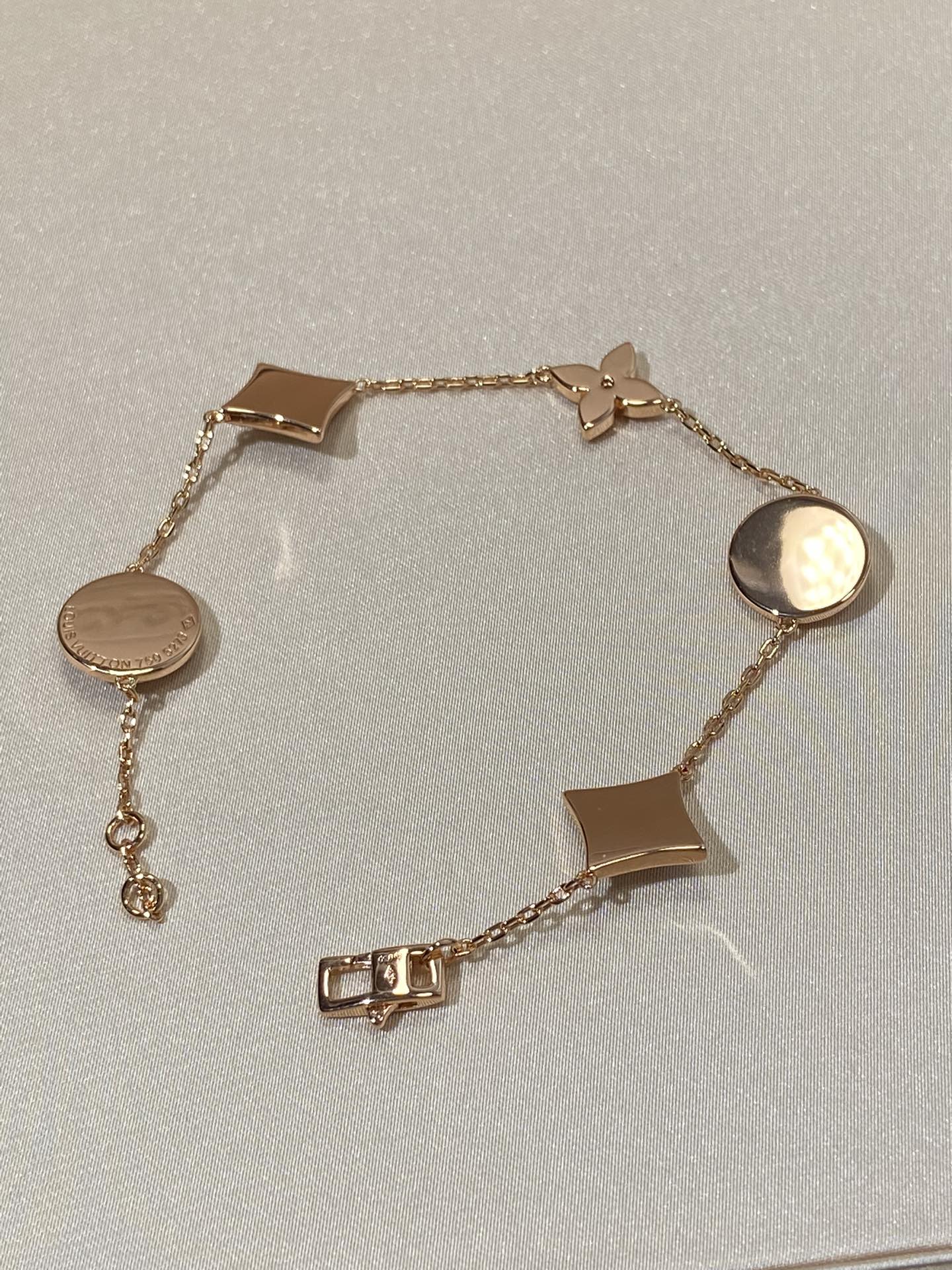 [Windsor Jewelry]STAR AND SUN 5 MOTIF MOP PINK GOLD BRACELET