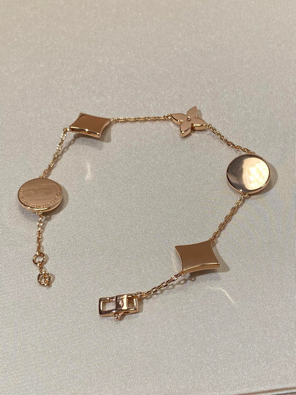 [Windsor Jewelry]STAR AND SUN 5 MOTIF MOP PINK GOLD BRACELET