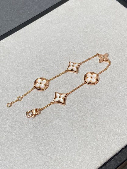 [Windsor Jewelry]STAR AND SUN 5 MOTIF MOP PINK GOLD BRACELET