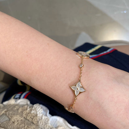 [Windsor Jewelry]STAR AND SUN 4 MOTIF WHITE MOP PINK GOLD BRACELET
