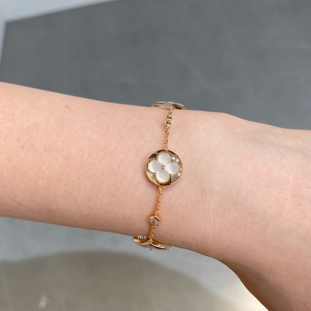 [Windsor Jewelry]STAR AND SUN 4 MOTIF WHITE MOP PINK GOLD BRACELET