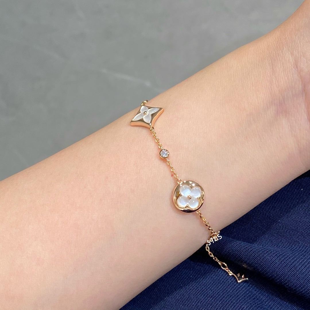 [Windsor Jewelry]STAR AND SUN 4 MOTIF WHITE MOP PINK GOLD BRACELET