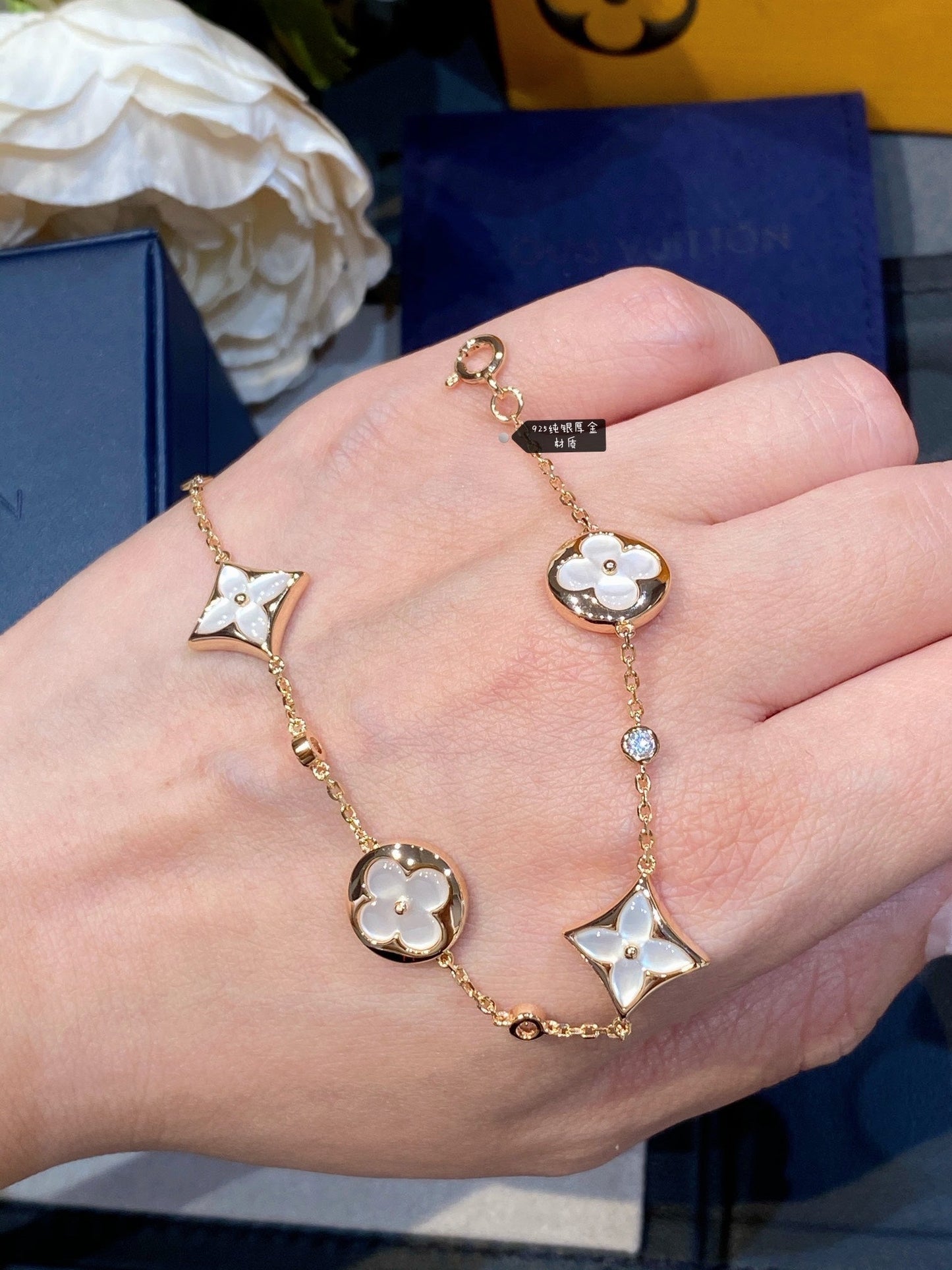 [Windsor Jewelry]STAR AND SUN 4 MOTIF WHITE MOP PINK GOLD BRACELET