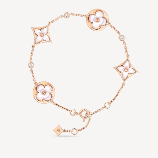 [Windsor Jewelry]STAR AND SUN 4 MOTIF WHITE MOP PINK GOLD BRACELET