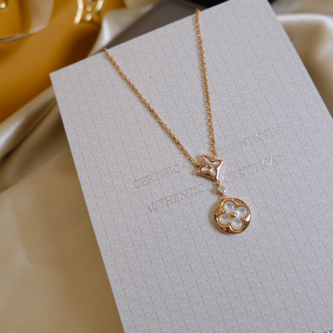 [Windsor Jewelry]STAR AND SUN WHITE MOP 2 MOTIF PINK GOLD NECKLACE