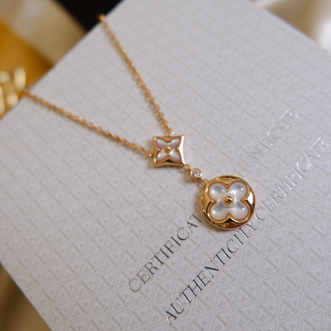 [Windsor Jewelry]STAR AND SUN WHITE MOP 2 MOTIF PINK GOLD NECKLACE