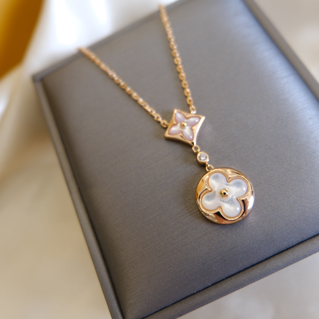 [Windsor Jewelry]STAR AND SUN WHITE MOP 2 MOTIF PINK GOLD NECKLACE