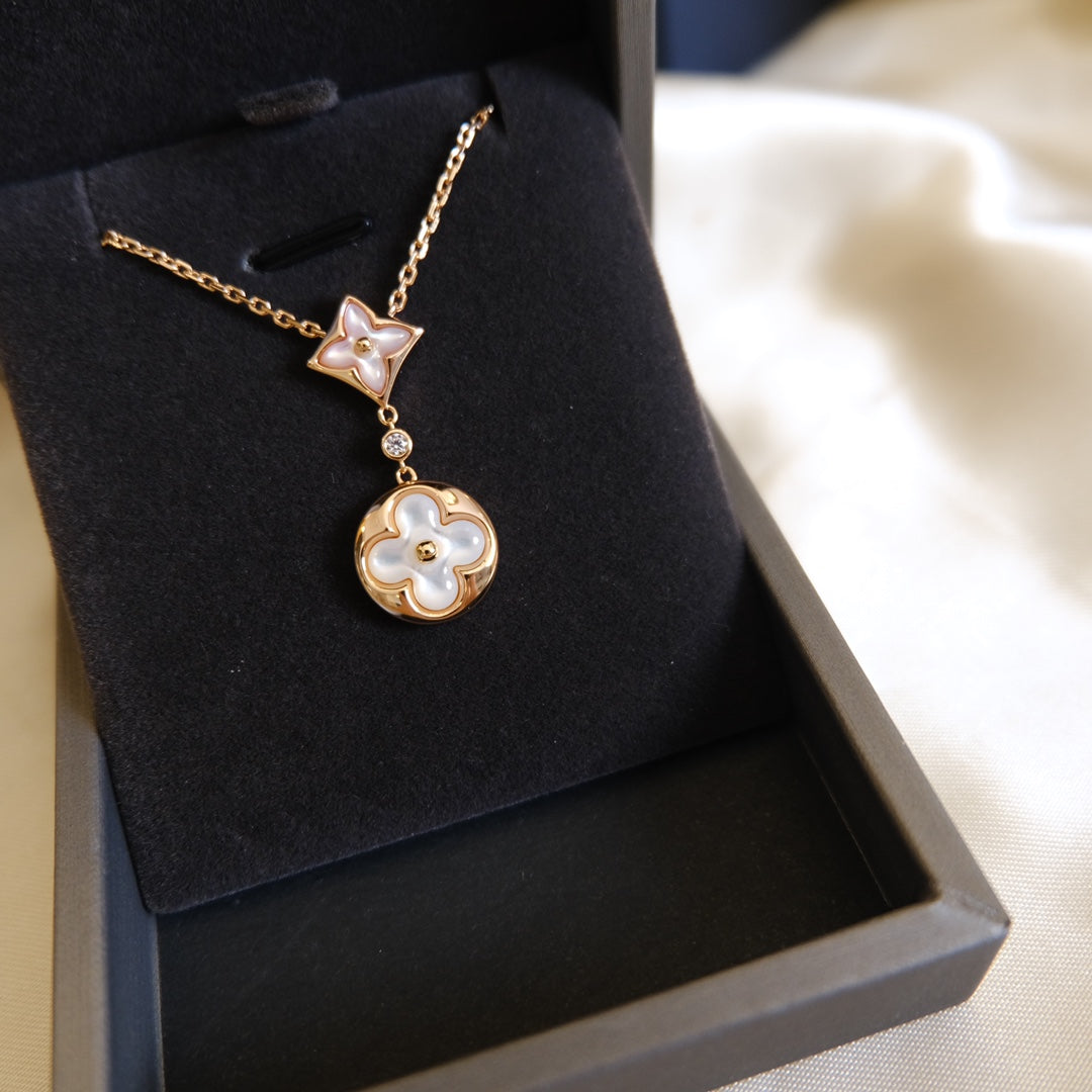 [Windsor Jewelry]STAR AND SUN WHITE MOP 2 MOTIF PINK GOLD NECKLACE