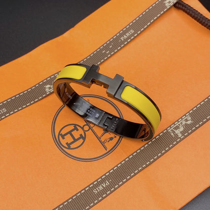 [Windsor Jewelry]CLIC HM SO BLACK YELLOW BRACELET