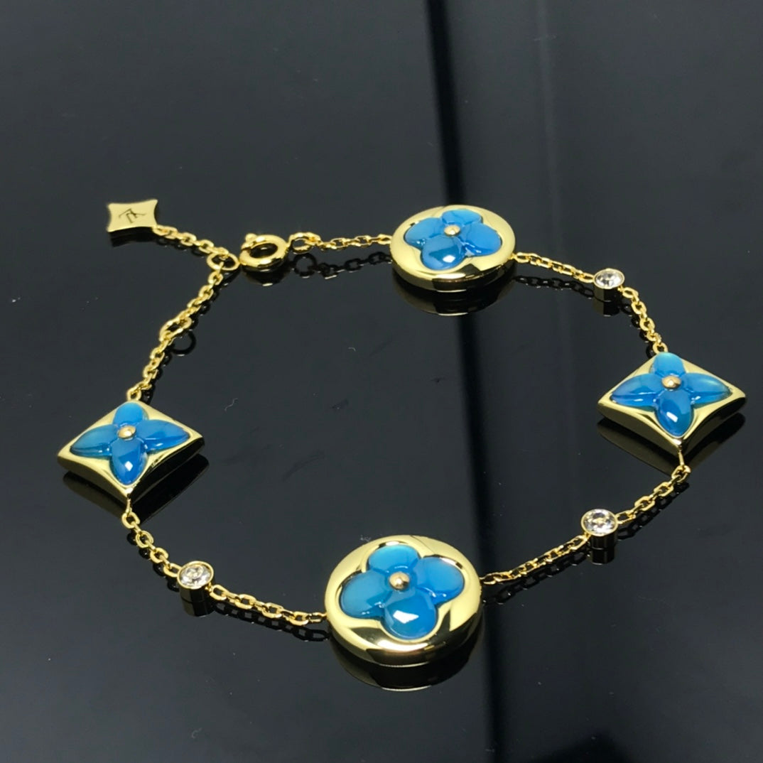 [Windsor Jewelry]STAR AND SUN 4 MOTIF BLUE BRACELET